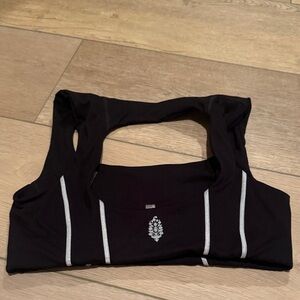 Black Sports Bra with Silver Accents. Free People.
